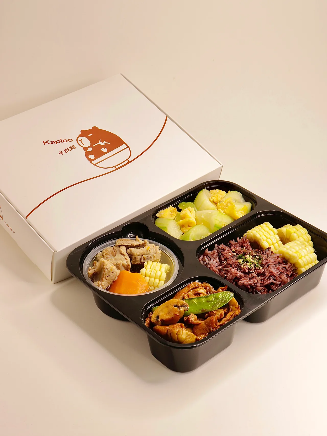 Kapioo bento meal with vegetables, rice and mains
